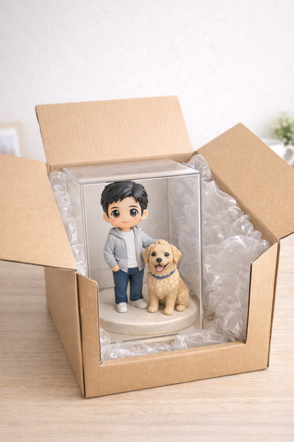 Custom human and pet figurine from photos shown in premium gift packaging